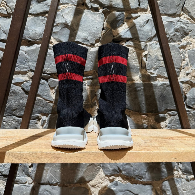 Back view of Vetements x Reebok Black Sock Pump Logo High-top Sneakers