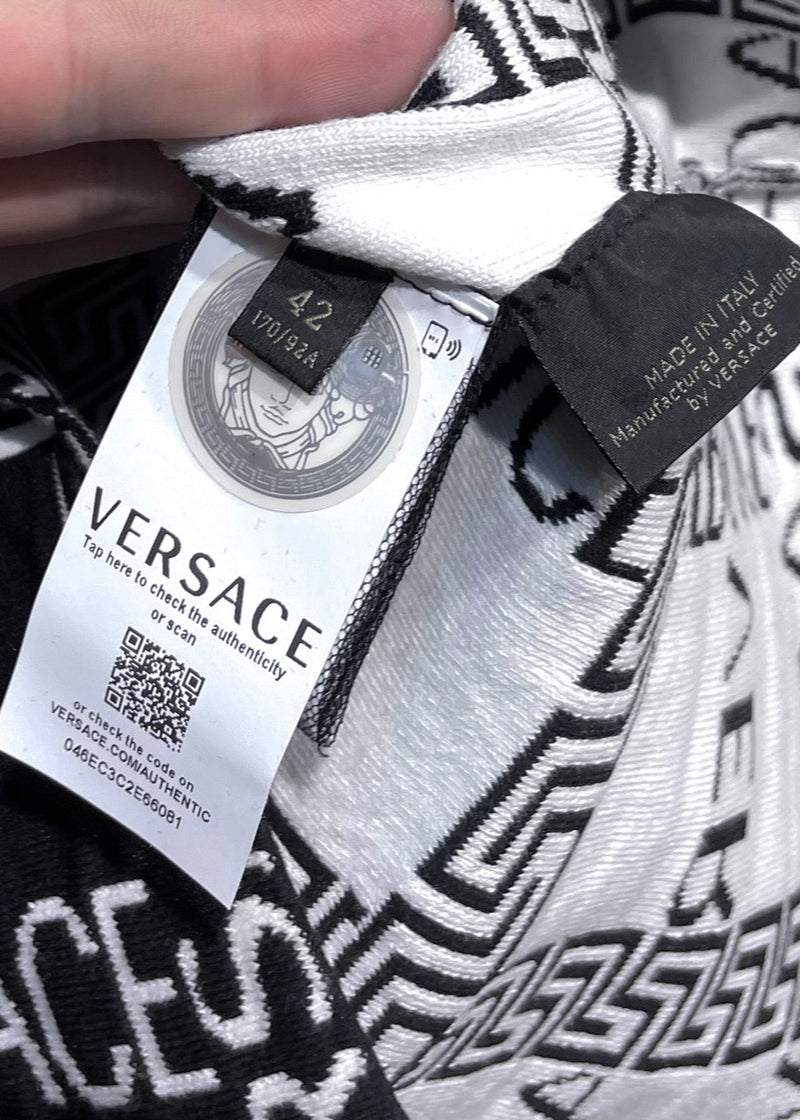Haut sans manches Versace à imprimé logo noir et blanc