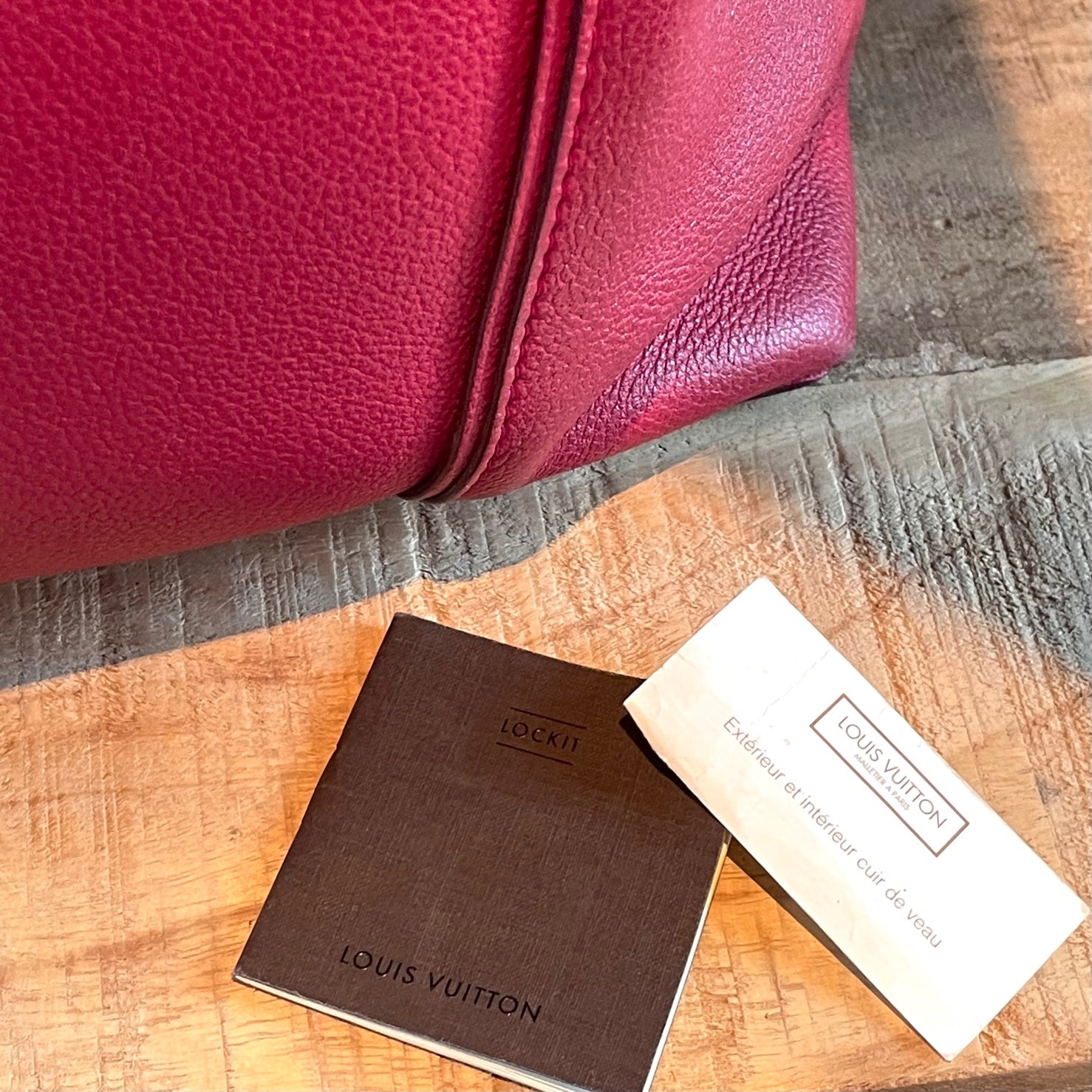 Louis Vuitton Rubis Taurillon Leather Soft Lockit MM Bag – Bagaholic