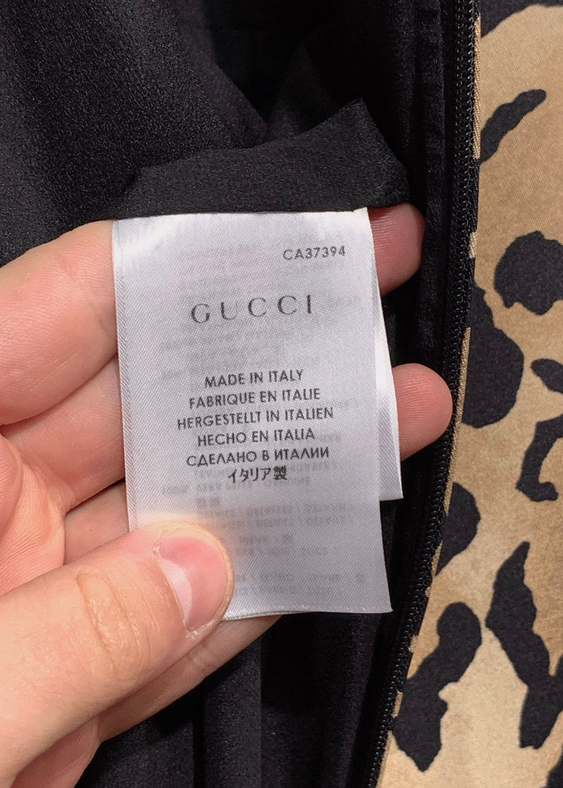 Robe en soie sans manches en cuir imprimé léopard Gucci