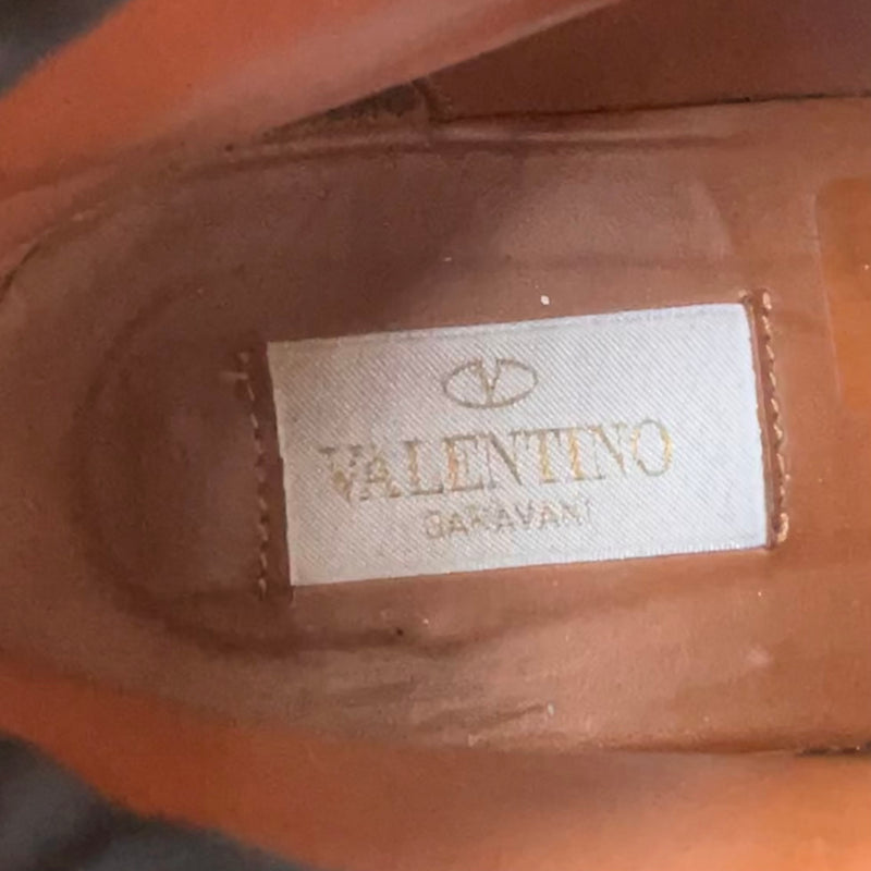 Bottes de combat Valentino Garavani en cuir noir à imprimé étoiles