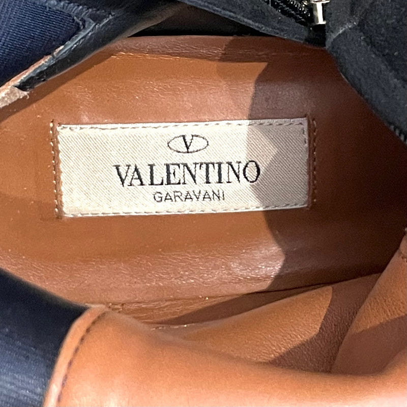 Bottes hautes cuissardes cloutées en daim noir Valentino
