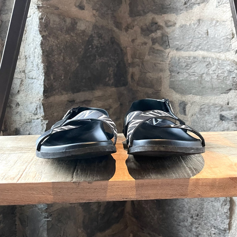 Valentino Black VLTN Crossed Strap Sandals